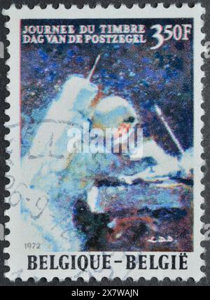 Cancelled postage stamp printed by Belgium, that shows David Randolph Scott on the Moon, circa 1972. Stock Photo