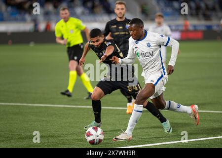 Lausanne, Switzerland. 21 May, 2024:  Liam Bollati (defender) of Grasshopper Club Zürich #54 defends against Samuel Kalu (attacker) of FC Lausanne-Sport #22 during  FC Lausanne Sport vs Grasshopper Club Zürich at  Tuiliere Stadium in Lausanne. Credit: Patrick Dancel/Alamy Live News Stock Photo