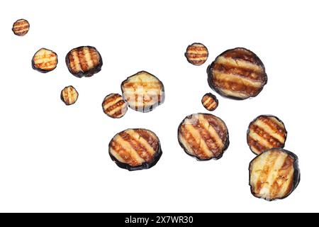 Slices of grilled eggplants in air on white background Stock Photo