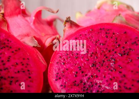 Red dragon fruit that is ripe and ready to be served on a plate is good for your health Stock Photo