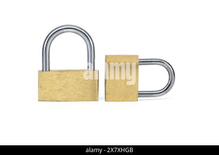 Two shiny gold padlocks that has a silver inner part isolated on white background Stock Photo