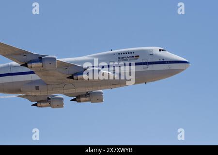 SOFIA, Stratospheric Observatory for Infrared Astronomy, modified Boeing 747-SP with registration N747NA, shown flying over Edwards AFB, last flight. Stock Photo