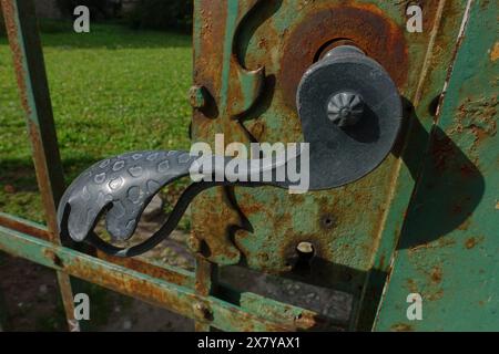 decorated handle of metal pedestrian gate to the park of Novi Sad Synagogue, Vojvodina, Serbia Stock Photo