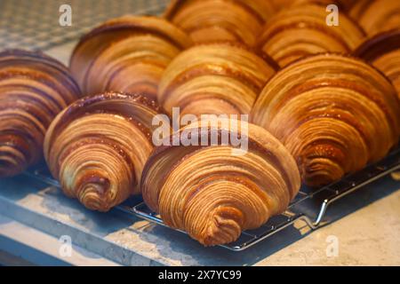 Close-up of fresh and beautiful croissants in a bakery showcase Stock Photo