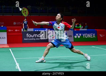 Kuala Lumpur, Malaysia. 22nd May, 2024. Han Yue of China hits a return during the women's singles round of 32 match against Karupathevan Letshanaa of Malaysia at Malaysia Masters 2024 in Kuala Lumpur, Malaysia, May 22, 2024. Credit: Chong Voon Chung/Xinhua/Alamy Live News Stock Photo