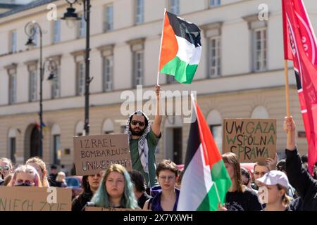 Warsaw, Poland. 17th May, 2024. A protester waves a Palestinian flag during the demonstration. Students studying at the University of Warsaw and other academic organizations in the city gathered to present an open letter to the university's rector. The letter demands the end to the school's cooperation in exchange programs with Israeli universities. (Credit Image: © Marek Antoni Iwanczuk/SOPA Images via ZUMA Press Wire) EDITORIAL USAGE ONLY! Not for Commercial USAGE! Stock Photo