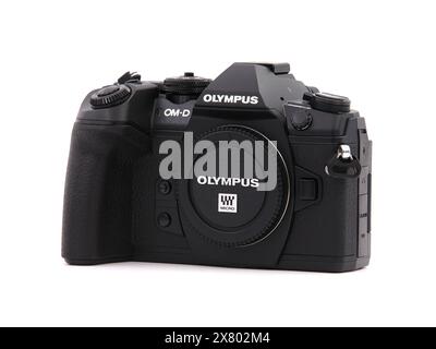 BUCHAREST, ROMANIA - AUGUST 21, 2020. Olympus OM-D E-M1 Mark II mirrorless micro four thirds digital camera, black body, isolated on white Stock Photo