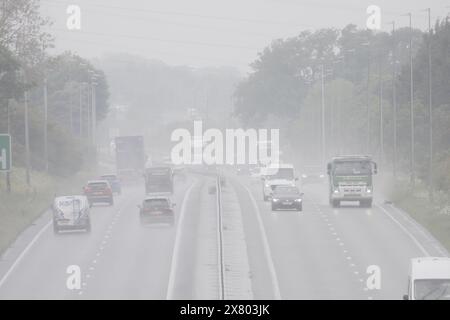 Flintshire, North Wales UK. UK Weather. 22nd May 2024, severe weather warning in place over North Wales with a Met Office Amber Warning for rain issued, Flintshire and North Wales.  Motorists travelling through the severe weather on the A55 as they pass through Halky, Flintshire  ©DGDImages/Alamy Live News Stock Photo