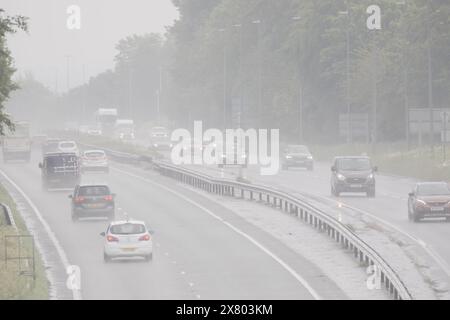 Flintshire, North Wales UK. UK Weather. 22nd May 2024, severe weather warning in place over North Wales with a Met Office Amber Warning for rain issued, Flintshire and North Wales.  Motorists travelling through the heavy rain on the A55, Halkyn, Flintshire as the Met Office Amber warning for rain begins to take hold.  ©DGDImages/Alamy Live News Stock Photo