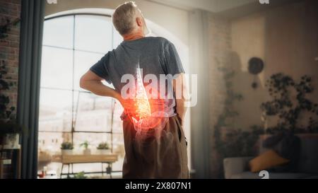 VFX Back Pain Augmented Reality Animation. Close Up of a Senior Male Experiencing Discomfort in a Result of Spine Trauma or Arthritis. Man Massaging and Stretching the Back to Ease the Injury. Stock Photo