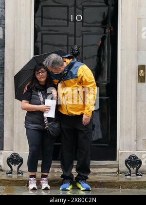 Figen Murray, mother of Manchester Arena bombing victim Martyn Hett, arrives in Downing Street, London with her husband Stuart, to hand in a letter about Martyn's Law to Number 10, after her 200-mile walk to London from the spot where her son was killed in Manchester. Martyn's Law is named in tribute to the 29-year-old who was one of 22 people killed at the end of an Ariana Grande concert in May 2017, would require venues and local authorities in the UK to have preventative plans against terror attacks. Picture date: Wednesday May 22, 2024. Stock Photo