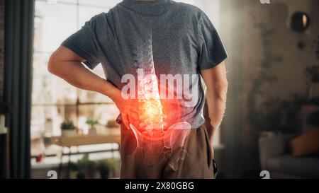 VFX Back Pain Augmented Reality Animation. Close Up of a Senior Male Experiencing Discomfort in a Result of Spine Trauma or Arthritis. Massaging and Stretching the Back to Ease the Injury. Stock Photo