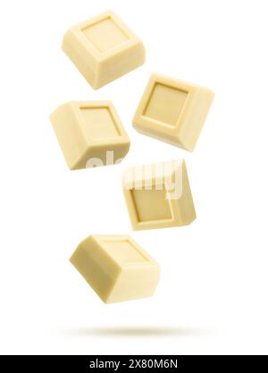 White chocolate blocks falling on white background. Stock Photo