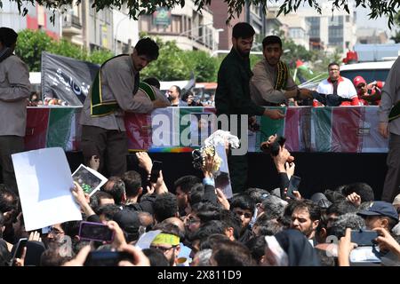 Tehran, Iran. 22nd May, 2024. People attend a memorial event held for Iran's late President Ebrahim Raisi, late Foreign Minister Hossein Amir-Abdollahian and others in Tehran, Iran, May 22, 2024. Credit: Shadati/Xinhua/Alamy Live News Stock Photo
