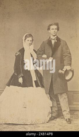 Antique 1867 carte de visite photograph, Ludwig II (1845-1886) and his fiancée Duchess Sophie Charlotte in Bavaria in 1867. Ludwig II, also called the Swan King or the Fairy Tale King, was King of Bavaria from 1864 until his death in 1886. SOURCE: ORIGINAL CDV Stock Photo