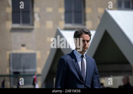 Caen, France. 22nd May, 2024. @ Pool/Blondet Eliot/Maxppp, France, caen, 2024/05/22 French Prime Minister Gabriel Attal during the national tribute to prison captain Fabrice Moello and supervisor Arnaud Garcia at the former prison in Caen, France, 22 May 2024 Credit: MAXPPP/Alamy Live News Stock Photo