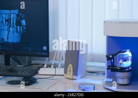Bobruisk, Belarus - April 10, 2024: CAD CAM dental equipment modern extraoral laboratory dental scanner. Selective focus. Stock Photo