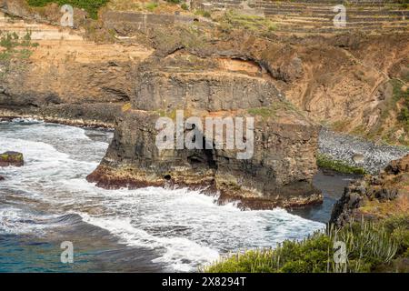 Roque Chico sea arch, an excellent example of coastal erosion by wave action from Rambla de Castro walking path near Puerto de la Cruz, Tenerife Stock Photo