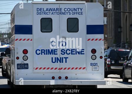 Chester, United States. 22nd May, 2024. Crime scene unit at the scene where 2 people are dead and three people are injured in a workplace shooting at Delaware County Linen on the 2600 block of W. 4th Street in Chester. The suspect involved in the mass shooting was captured by police. Credit: SOPA Images Limited/Alamy Live News Stock Photo