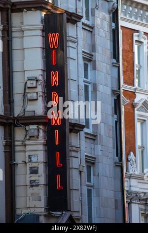 London, UK - January 15th 2024: The neon sign on the exterior of the Windmill Theatre, located on Great Windmill Street in London, UK. Stock Photo