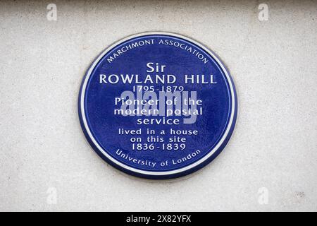 London, UK - February 5th 2024: Blue plaque on the exterior of a building on Cartwright Gardens in London, UK, marking the location where Sir Rowland Stock Photo