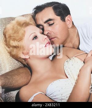 THE EDDY DUCHIN STORY 1956 Columbia Pictures film with Kim Novak as Marjorie  Oelrichs and Tyrone Power as band leader Eddy Duchin. Stock Photo