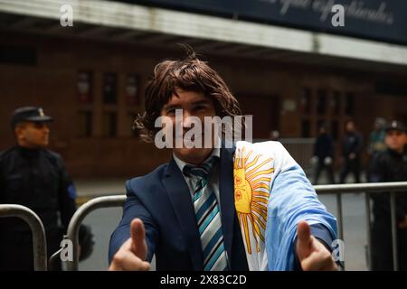 Buenos Aires, Argentina. 22nd May, 2024. Hundreds of supporters of Argentine President Javier Milei gather outside the radio station where he will present his new book and perform a show.  Buenos Aires, Argentina, 22 May, 2024. Credits Guillermo Castro Credit: Guillermo Castro/Alamy Live News Stock Photo