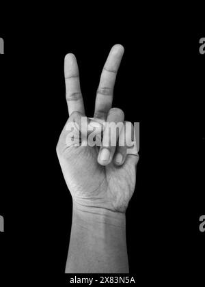 Number Two Hand Sign, Isolated on Black Background Stock Photo