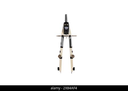 Metal precision compass for geometric drawings on a white background Stock Photo
