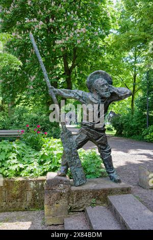 Ferryman, bronze sculpture Faehrmann hol ueber by Georg Guenther Zeuner, Cathedral Garden of Speyer, Speyer, Speyer, Rhineland-Palatinate, Germany Stock Photo