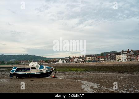 Small boats moored in the harbour at Rhos-on-Sea, Wales, Uk at low tide. Stock Photo