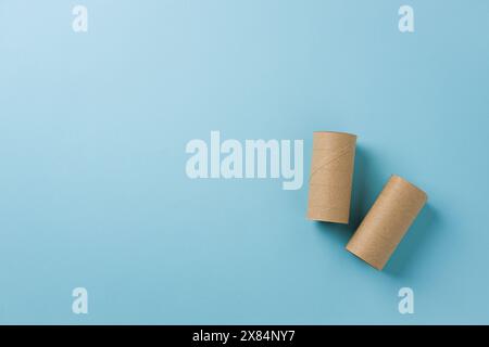 Top view of two empty toilet paper rolls on blue background Stock Photo