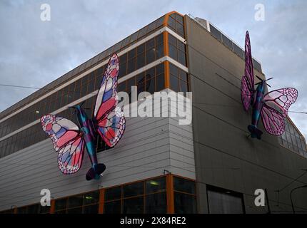 Prague, Czech Republic. 22nd May, 2024. Moving sculptures of butterflies by Czech artist David Cerny on the facade of the Maj department store in Prague, Czech Republic, pictured on May 22, 2024. The butterfly fuselages are imitations of Spitfire fighters, the installation is a tribute to Czechoslovak airmen who fought in World War II. Credit: Michal Krumphanzl/CTK Photo/Alamy Live News Stock Photo