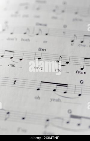 Closeup shot of old music notes Stock Photo