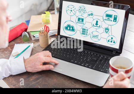 Cloud networking concept shown on a laptop screen Stock Photo