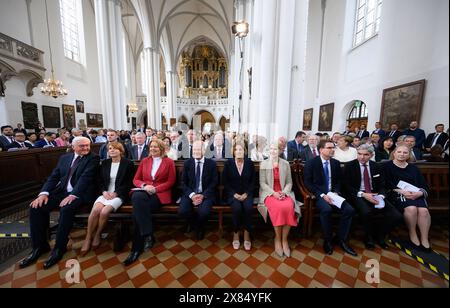 23 May 2024, Berlin: The representatives of the constitutional bodies (l-r), Federal President Frank-Walter Steinmeier and his wife Elke Büdenbender, Bundestag President Bärbel Bas (SPD), Federal Chancellor Olaf Scholz (SPD) and his wife Britta Ernst, Manuela Schwesig (SPD), Minister President of Mecklenburg-Western Pomerania and current President of the Bundesrat, and her husband Stefan Schwesig, as well as Stephan Harbarth, President of the Federal Constitutional Court, and his wife Juliane Harbarth sit at the ecumenical service to mark the 75th anniversary of the Basic Law in St. Mary's Chu Stock Photo