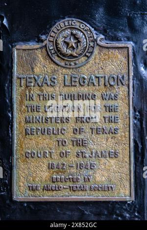 London, UK - February 19th 2024: Plaque on the exterior of Berry Bros and Rudd wine merchants, marking the location of the former Texas Legation in th Stock Photo