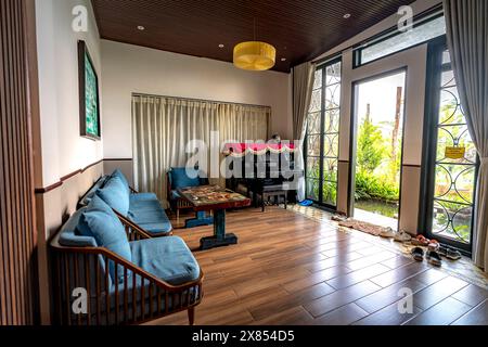 Gia Nghia Town, Dak Nong Province, Vietnam - February 14, 2024: Close-up of a large room with Asian-style decoration and design in Gia Nghia Town, Dak Stock Photo