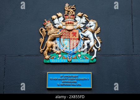 London, UK - February 26th 2024: The Royal Warrant on the exterior of Heywood Hill bookshop on Curzon Street in London, UK. Stock Photo
