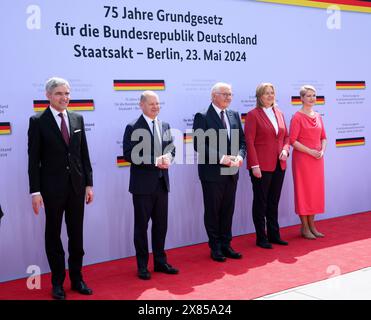 23 May 2024, Berlin: The representatives of the constitutional bodies (l-r), Stephan Harbarth, President of the Federal Constitutional Court, Federal Chancellor Olaf Scholz (SPD), Federal President Frank-Walter Steinmeier, Bundestag President Bärbel Bas (SPD) and Manuela Schwesig (SPD), Minister President of Mecklenburg-Western Pomerania and current President of the Bundesrat, stand together for a group photo at the state ceremony to mark '75 years of the Basic Law' in the forum between the Bundestag and the Federal Chancellery. The Basic Law of the Federal Republic of Germany was proclaimed o Stock Photo