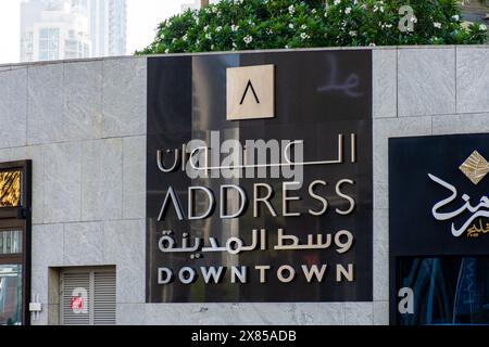 Address Downtown Hotel Signboard name on the wall, Dubai City, UAE. Stock Photo