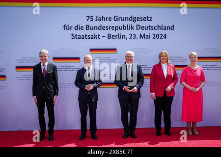 23 May 2024, Berlin: Stephan Harbarth (l-r), President of the Federal Constitutional Court, Federal Chancellor Olaf Scholz (SPD), Federal President Frank-Walter Steinmeier, Bärbel Bas (SPD), President of the Bundestag, and Manuela Schwesig (SPD), President of the Bundesrat and Minister-President of Mecklenburg-Western Pomerania, stand together at the state ceremony to mark '75 years of the Basic Law' in the forum between the Bundestag and the Federal Chancellery. The Basic Law of the Federal Republic of Germany was promulgated on May 23, 1949 and came into force the following day. The annivers Stock Photo