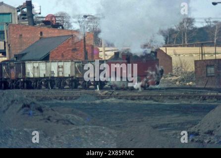 UK Coal mining in the 1960's, Steam train shunting wagons at Newmarket Colliery, Wakefield, west Yorkshire, north England, UK Stock Photo