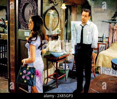 THE WORLD OF SUZIE WONG  1960 Paramount Pictures film with Nancy Kwan as Suzie Wong and William Holden as Robert Lomax Stock Photo