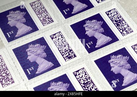 UK First Class Postage Stamps with the new Bar Code system introduced by the UK Post office in 2023 Stock Photo