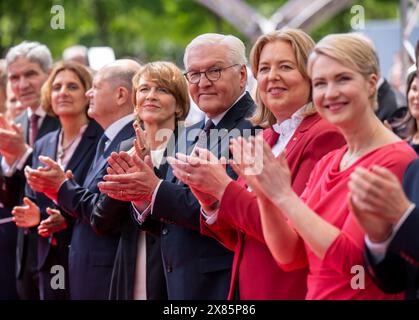 23 May 2024, Berlin: Federal President Frank-Walter Steinmeier stands between (l-r) Stephan Harbarth, President of the Federal Constitutional Court, Britta Ernst, Federal Chancellor Olaf Scholz (SPD), Elke Büdenbender, Bärbel Bas (SPD), President of the Bundestag, and Manuela Schwesig (SPD), President of the Bundesrat and Minister President of Mecklenburg-Western Pomerania, after his speech at the state ceremony to mark '75 years of the Basic Law' at the forum between the Bundestag and the Federal Chancellery. The Basic Law of the Federal Republic of Germany was proclaimed on May 23, 1949 and Stock Photo