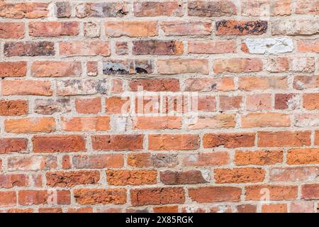 Old brick wall with aged patina feel Stock Photo