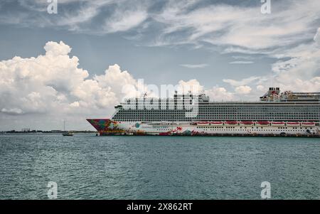 Penang, Malaysia - Nov 1, 2022: Genting Dream, a cruise ship belonging to Resorts World Cruises, docked at the cruise terminal in Swettenham Pier. Stock Photo