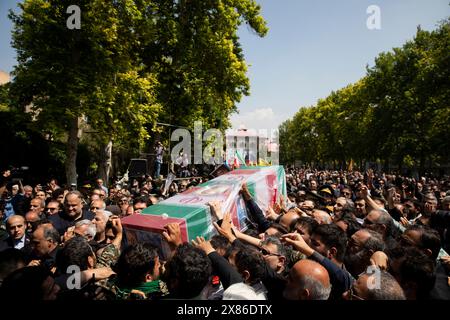 Tehran, Iran. 22nd May, 2024. Iranians attend a funeral ceremony for the late President Ebrahim Raisi and his companions who were killed during a helicopter crash on Sunday in a mountainous region of the country's northwest, in Tehran, Iran, Wednesday, May 22, 2024. (Photo by Sobhan Farajvan/Pacific Press/Sipa USA) Credit: Sipa USA/Alamy Live News Stock Photo