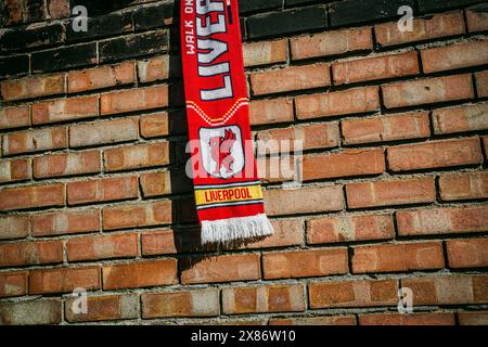 Liverpool FC scarf with brick wall Stock Photo